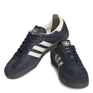 Navy blue adidas sambas